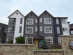 Cobalt beach townhome outisde view in Jensen lakes St. Albert, white grey and navy home exterior with black and white trim.